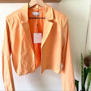 L’Academie orange cropped blazer